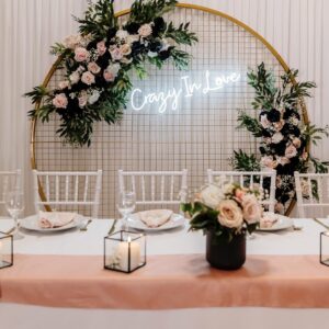 Floral-Arbour-with-neon-sign-scaled